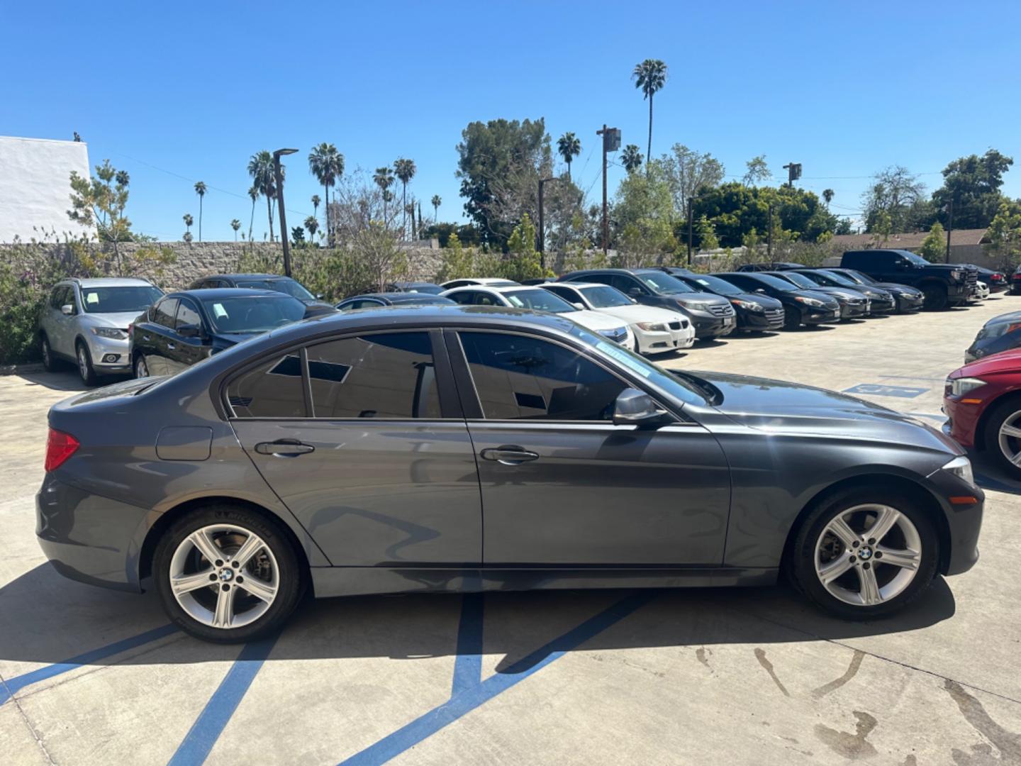 2014 Gray /Black BMW 3-Series leather (WBA3B1C52EK) with an 4 Cylinder engine, Automatic transmission, located at 30 S. Berkeley Avenue, Pasadena, CA, 91107, (626) 248-7567, 34.145447, -118.109398 - Photo#5